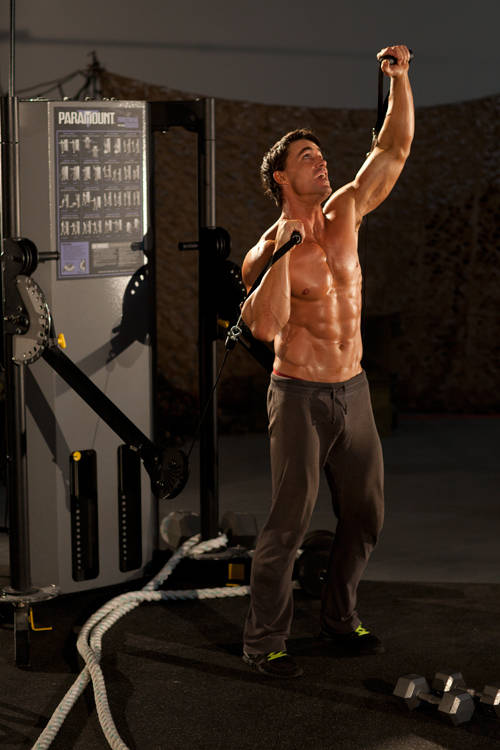 Alternating Cable Shoulder Press - ending position