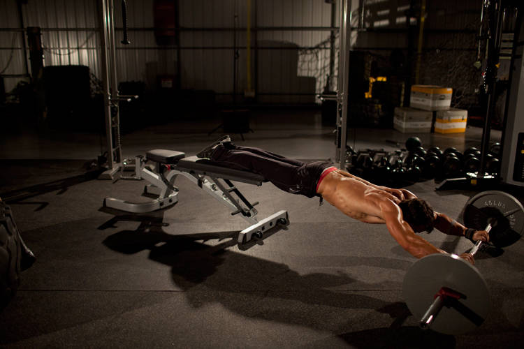 Barbell Rollout from Bench - ending position