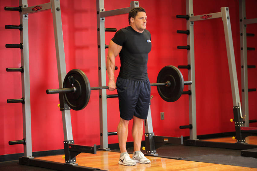 Barbell Shrug Behind The Back - ending position