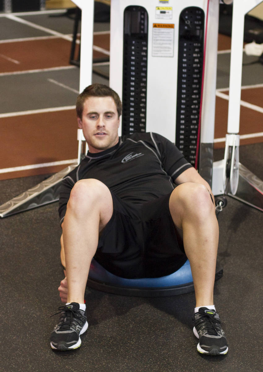 Bosu Ball Cable Crunch With Side Bends - ending position