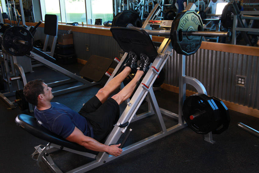 Calf Press On The Leg Press Machine - ending position