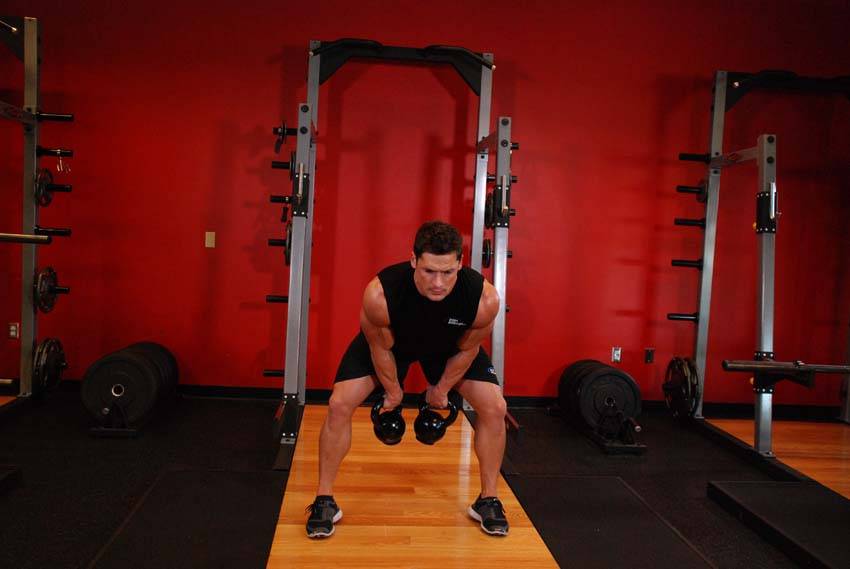 Double Kettlebell Snatch - ending position