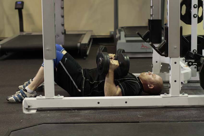 Dumbbell Floor Press - ending position