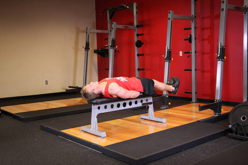 Flat Bench Lying Leg Raise - starting position