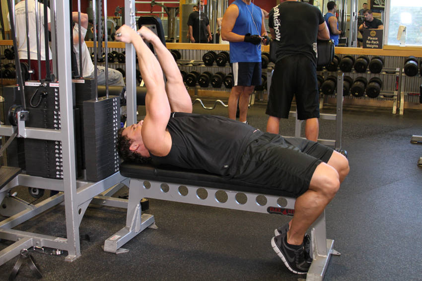 High Cable Curls - starting position