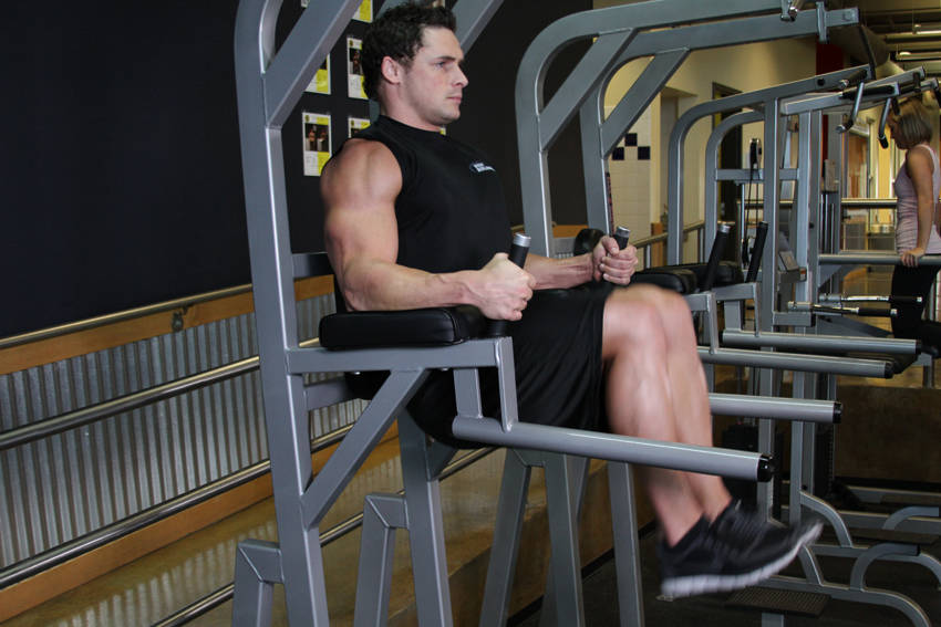 Knee/Hip Raise On Parallel Bars - ending position