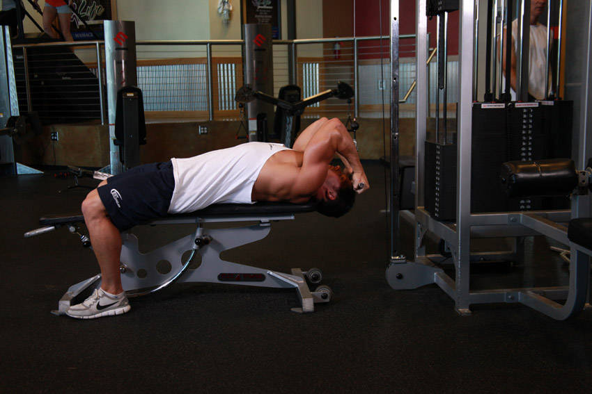 Lying Close-Grip Bar Curl On High Pulley - ending position
