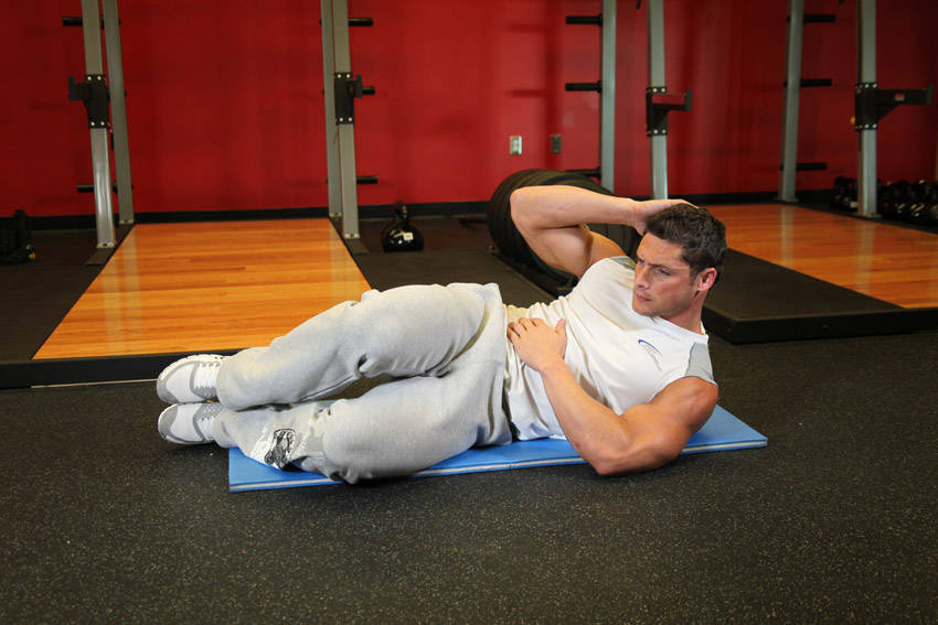 Oblique Crunches - On The Floor - ending position