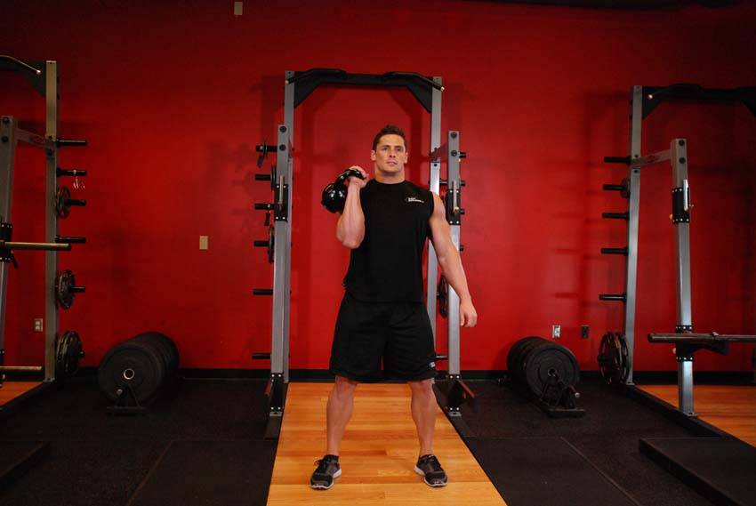 One-Arm Kettlebell Clean and Jerk - ending position