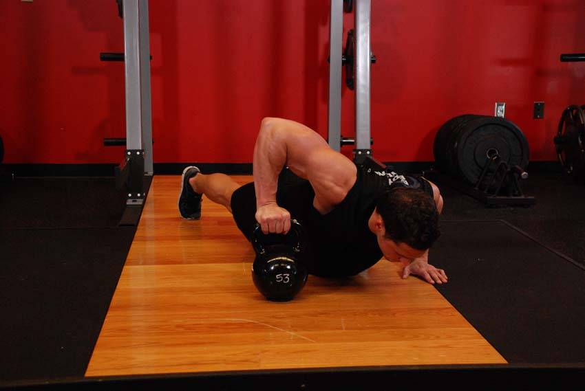 Plyo Kettlebell Pushups - ending position