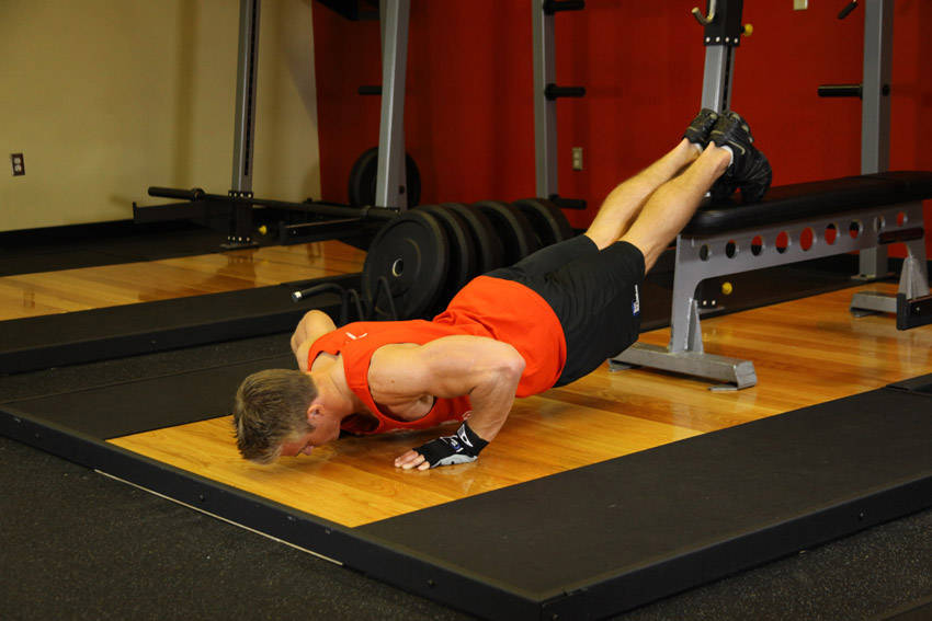 Push-Ups With Feet Elevated - ending position