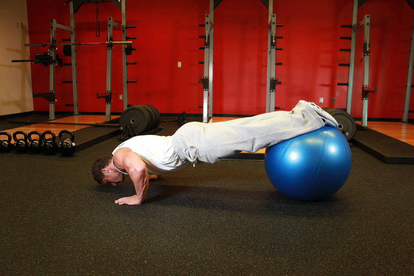 Push-Ups With Feet On An Exercise Ball - starting position