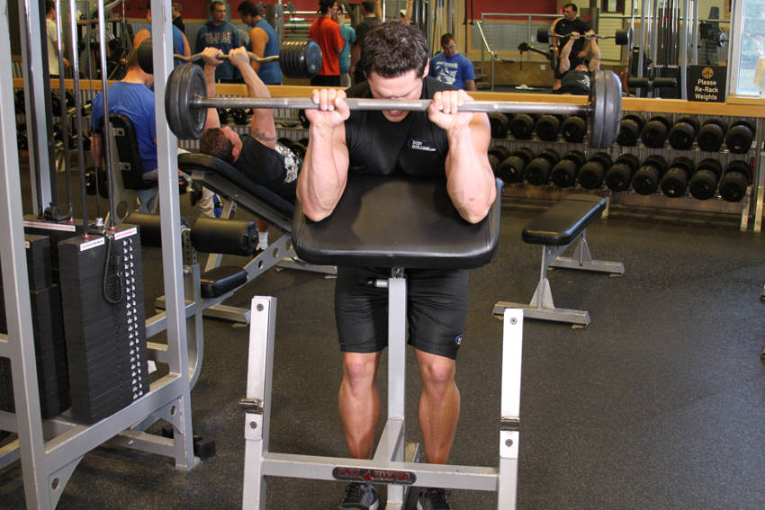 Reverse Barbell Preacher Curls - ending position