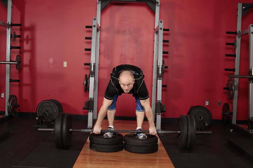 Romanian Deadlift from Deficit - ending position