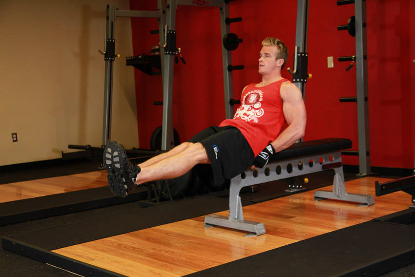 Seated Flat Bench Leg Pull-In - starting position