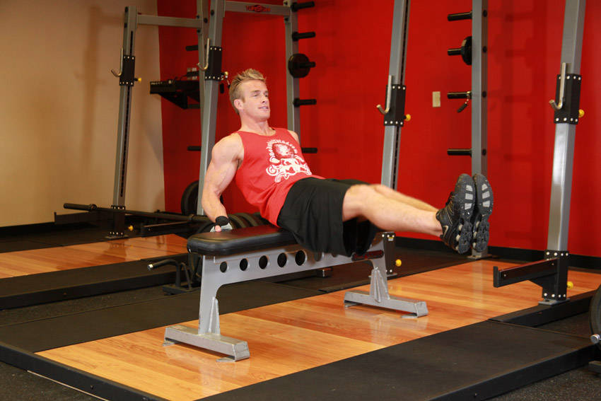 Seated Leg Tucks - ending position