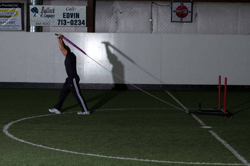 Sled Overhead Triceps Extension - ending position