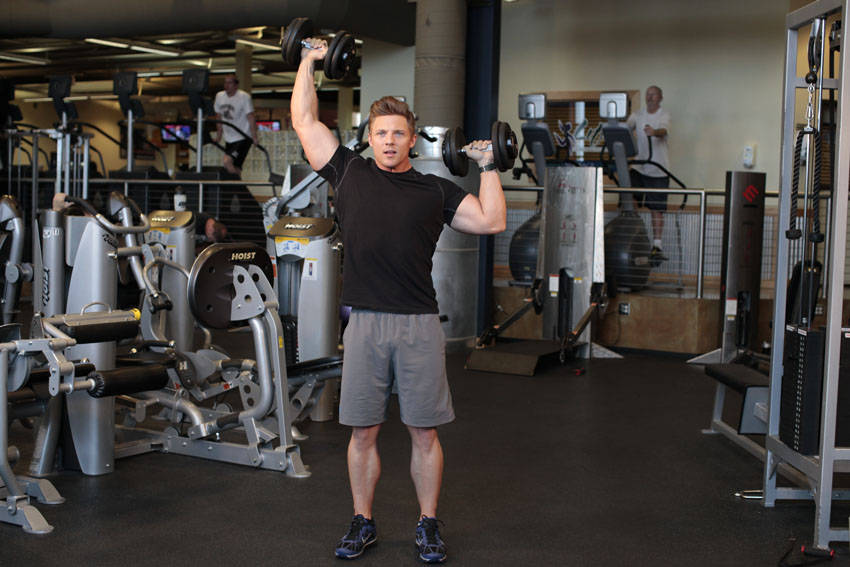 Standing Alternating Dumbbell Press - ending position