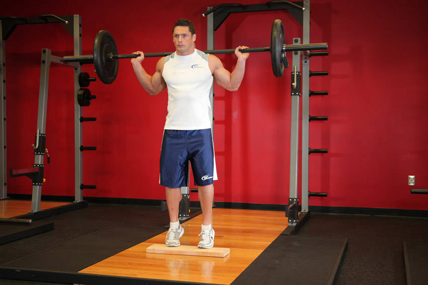 Standing Barbell Calf Raise - starting position