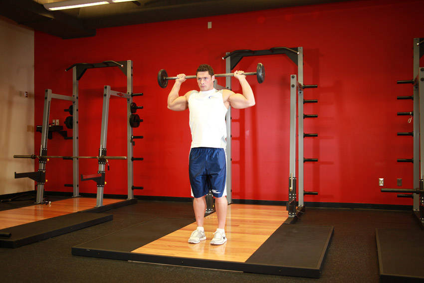 Standing Barbell Press Behind Neck - starting position