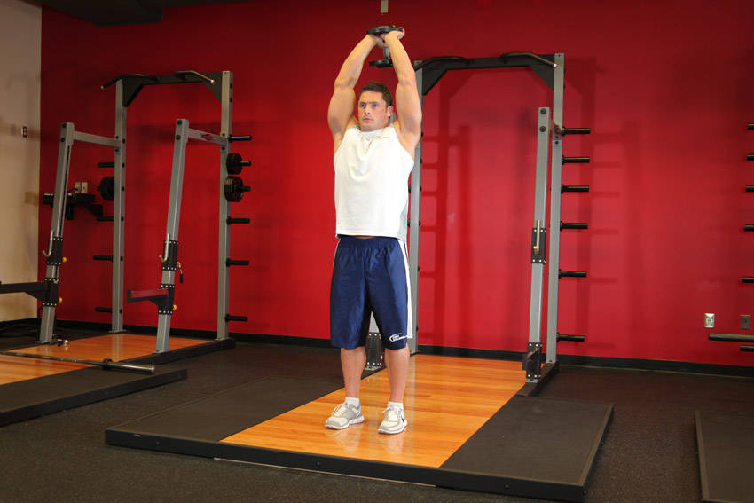Standing Dumbbell Triceps Extension - starting position
