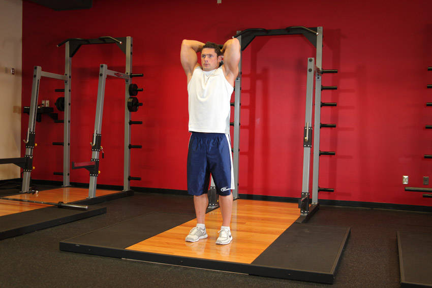 Standing Dumbbell Triceps Extension - ending position