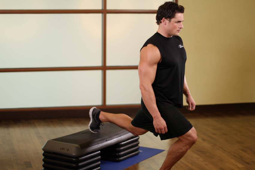 Standing Elevated Quad Stretch - starting position