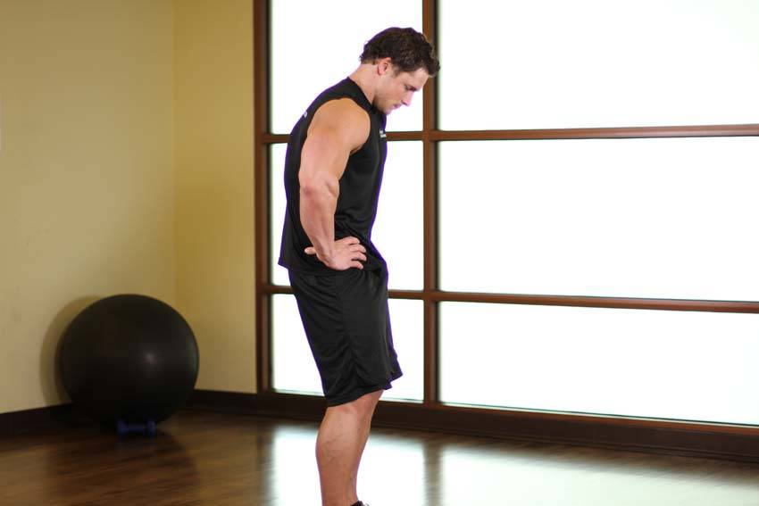 Standing Pelvic Tilt - ending position