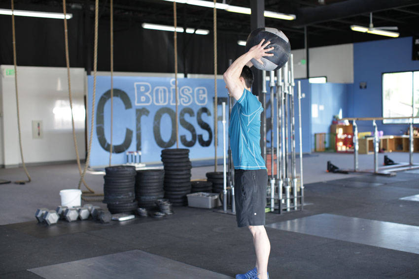 Standing Two-Arm Overhead Throw - ending position