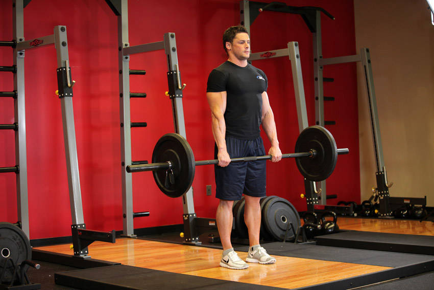 Stiff-Legged Barbell Deadlift - ending position