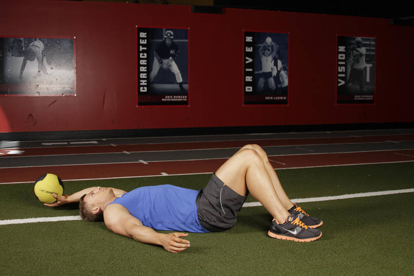 Supine One-Arm Overhead Throw - starting position