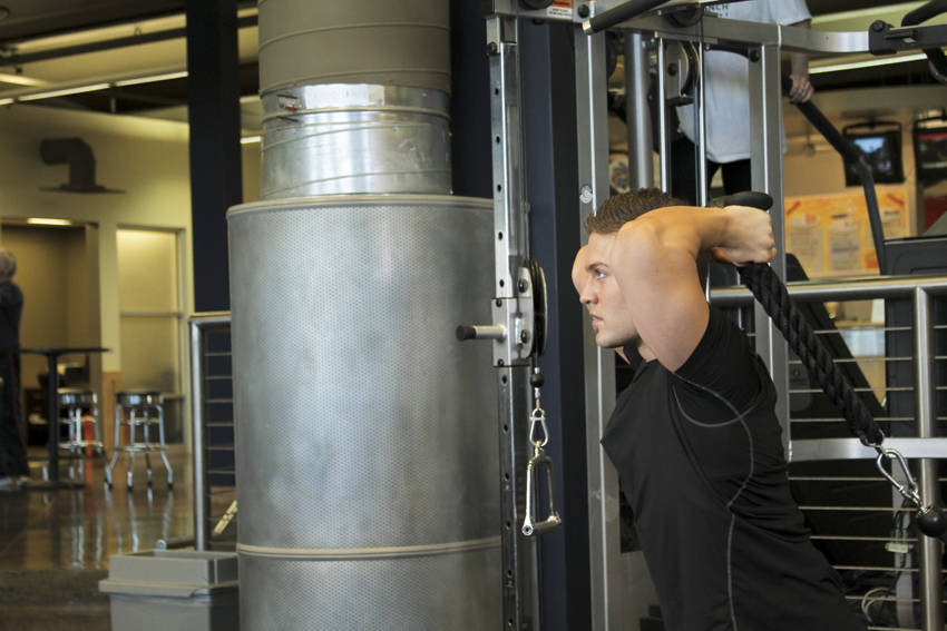 Triceps Overhead Extension with Rope - starting position