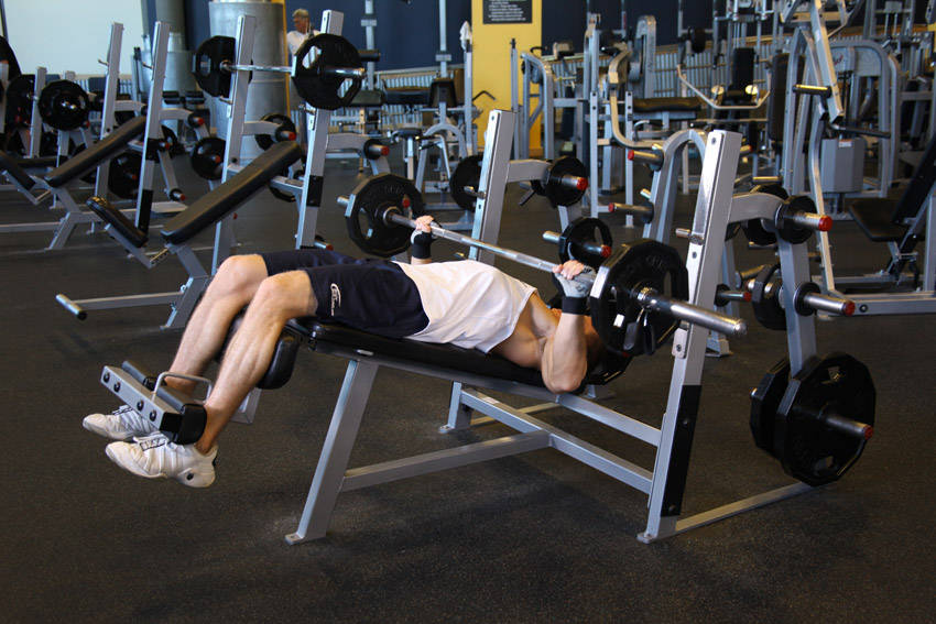 Wide-Grip Decline Barbell Bench Press - ending position